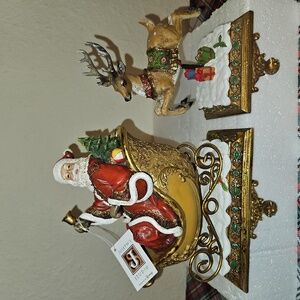 Joseph's Studio Festive Santa and Reindeer Stocking Holder Set